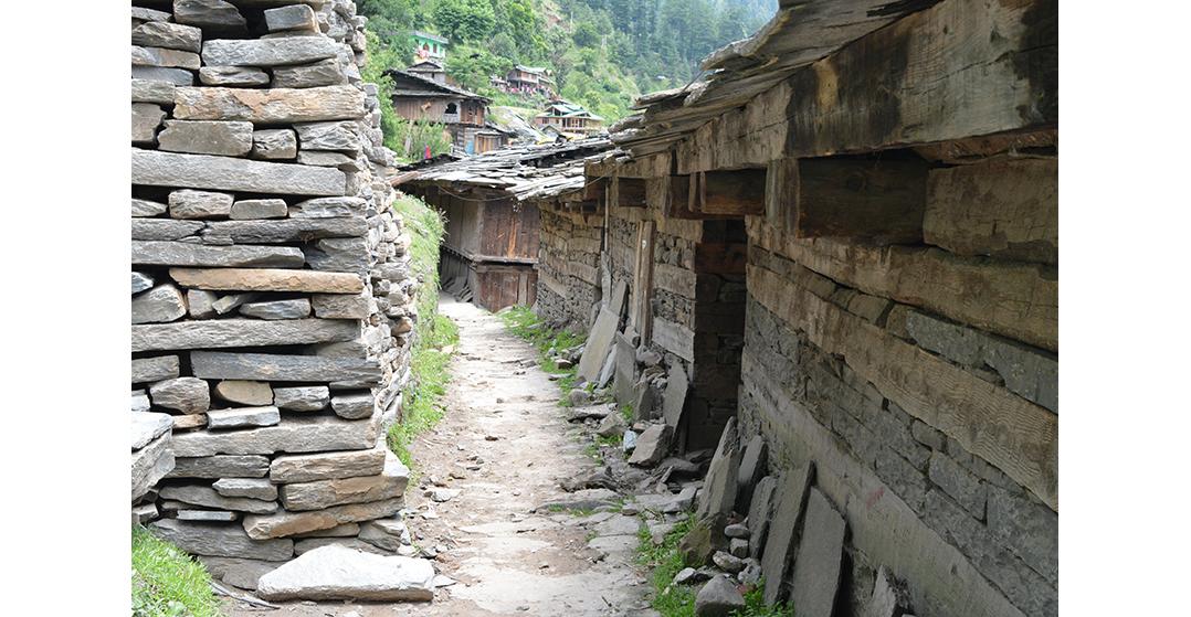 Village street of Jana, Kullu, through a series of homes built in traditional Kath-kuni style of architecture