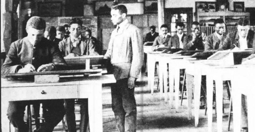 Students and faculty in a Tuskegee drafting class